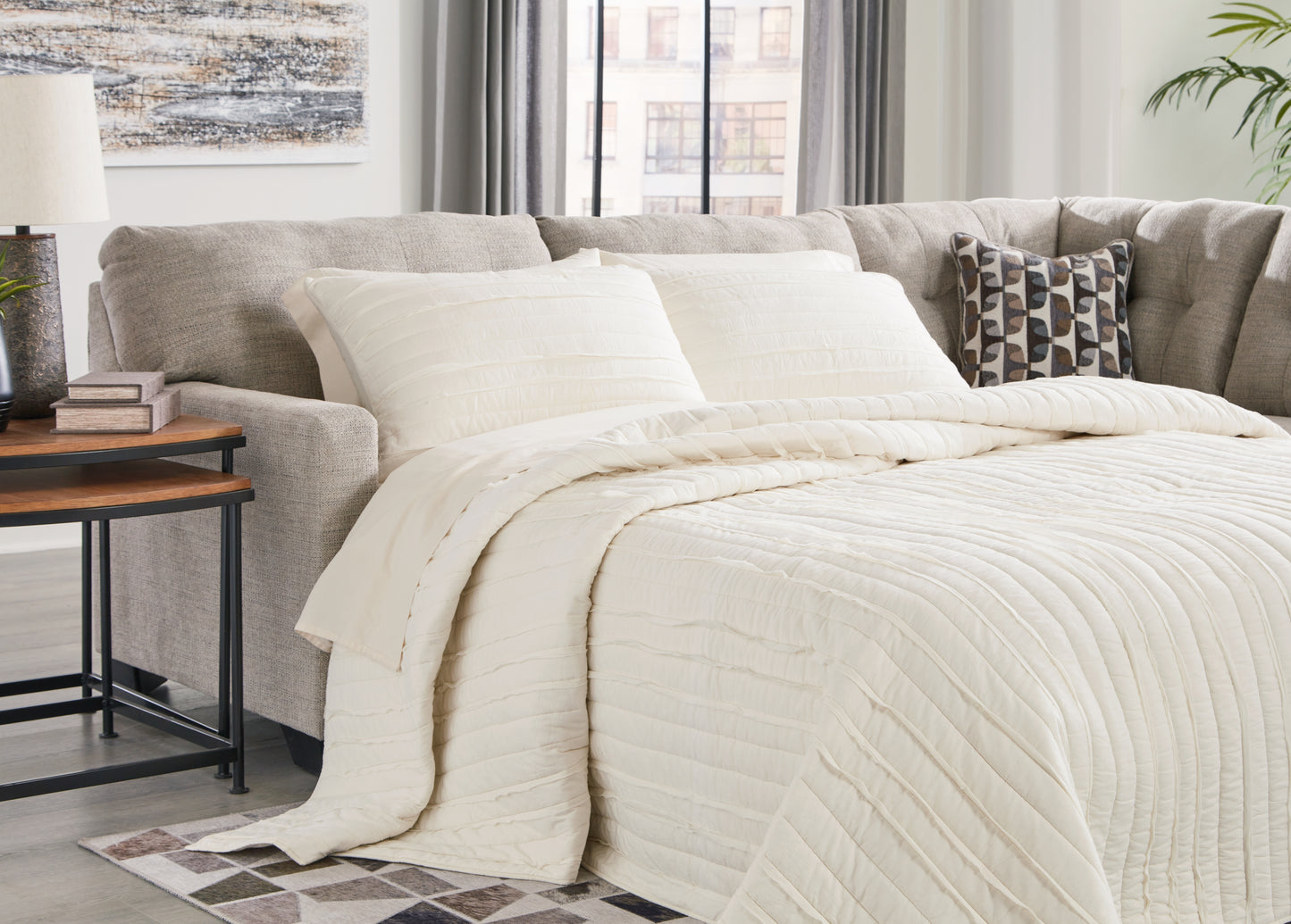 Myers Furniture Outlet - Ashley Furniture - Mahoney Sectional - 2-Piece Sleeper Sectional with Chaise / Pebble - 31004S4