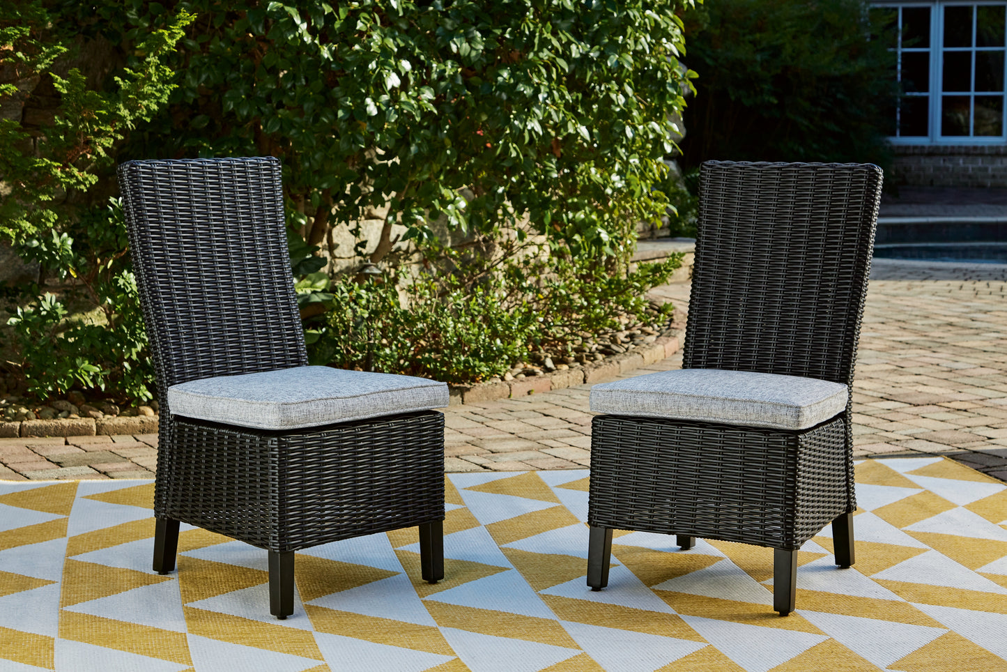 Myers Furniture Outlet - Ashley Furniture - Beachcroft Outdoor - Side Chair with Cushion (Set of 2) / Black/Light Gray - P792-601