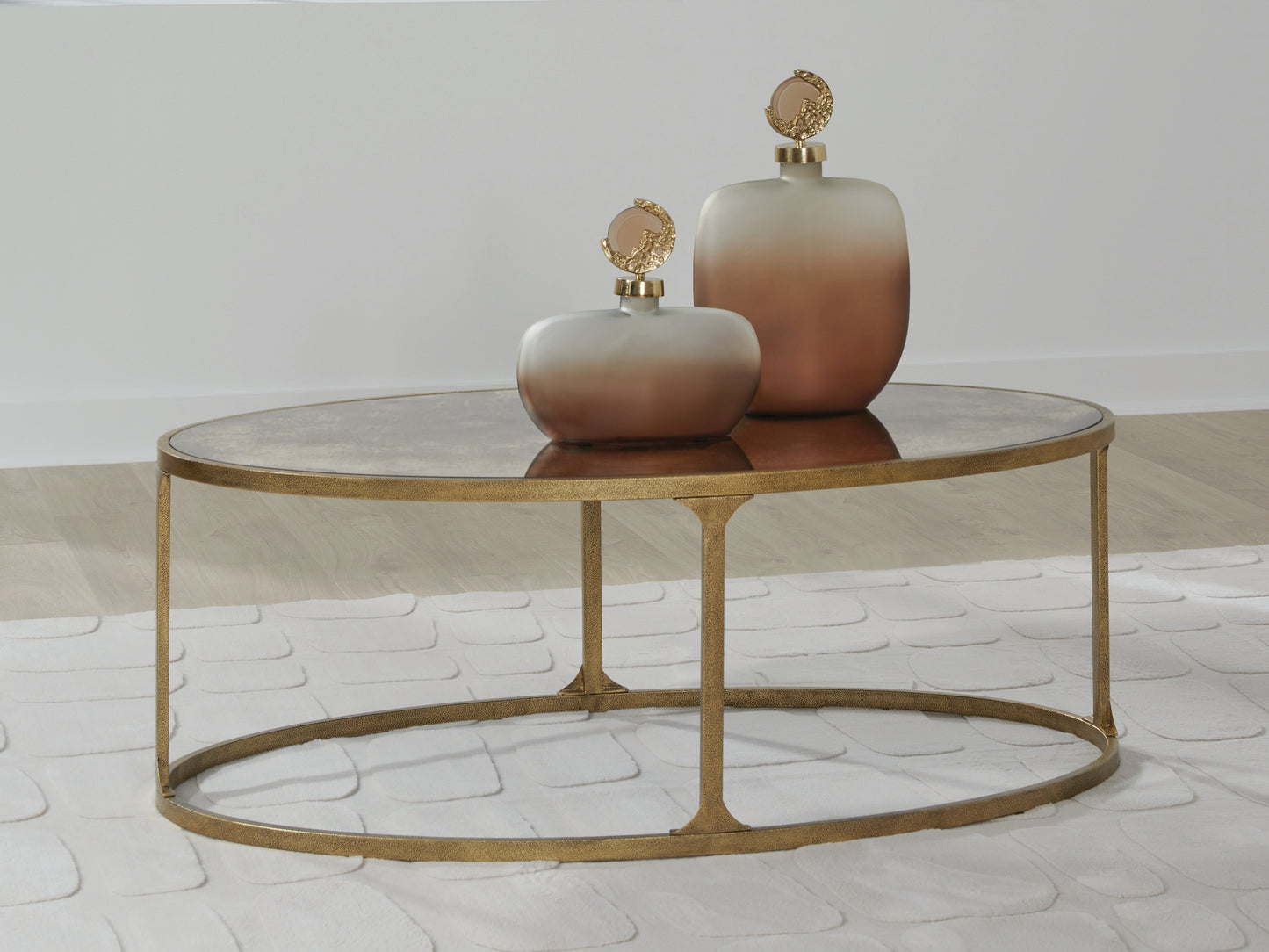 Myers Furniture Outlet - Ashley Furniture - Korajane Coffee Table - Oval Cocktail Table / Antique Gold - T399-0