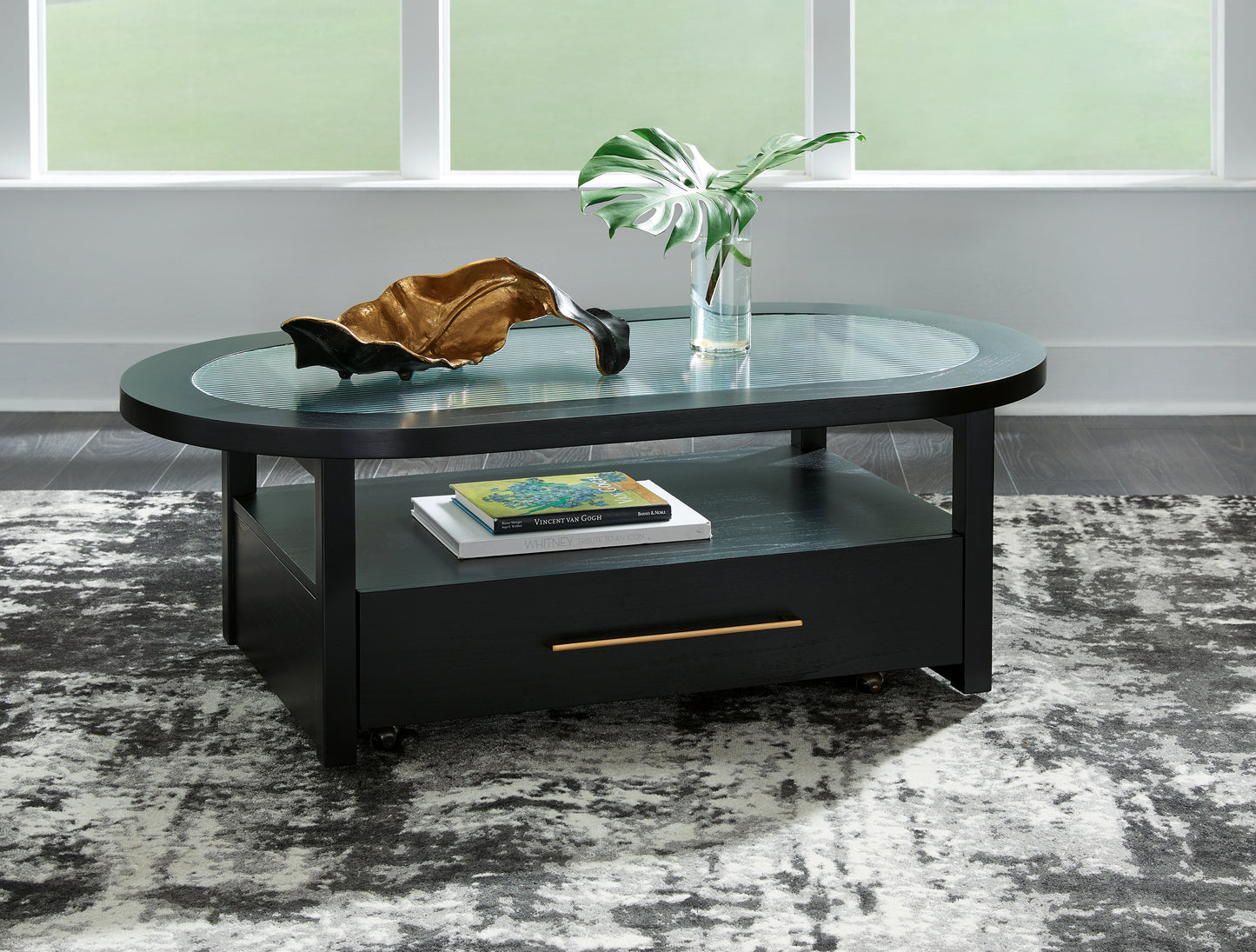Myers Furniture Outlet - Ashley Furniture - Winbardi Coffee Table - Oval Cocktail Table / Black - T786-0
