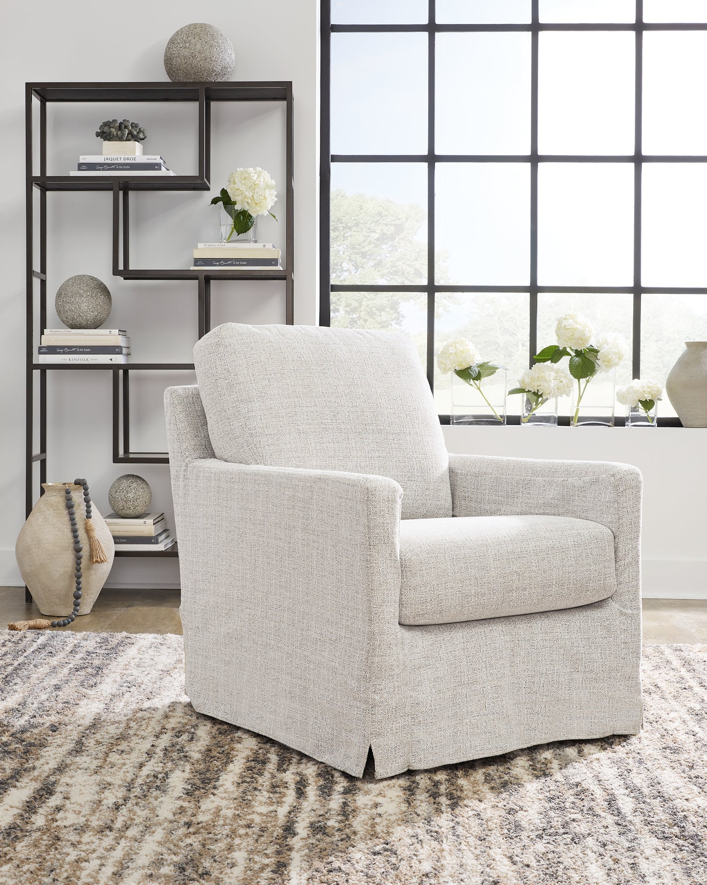 Myers Furniture Outlet - Ashley Furniture - Nenana Next-Gen Nuvella Swivel Glider Accent Chair - Swivel Glider Accent Chair / Denim - A3000646