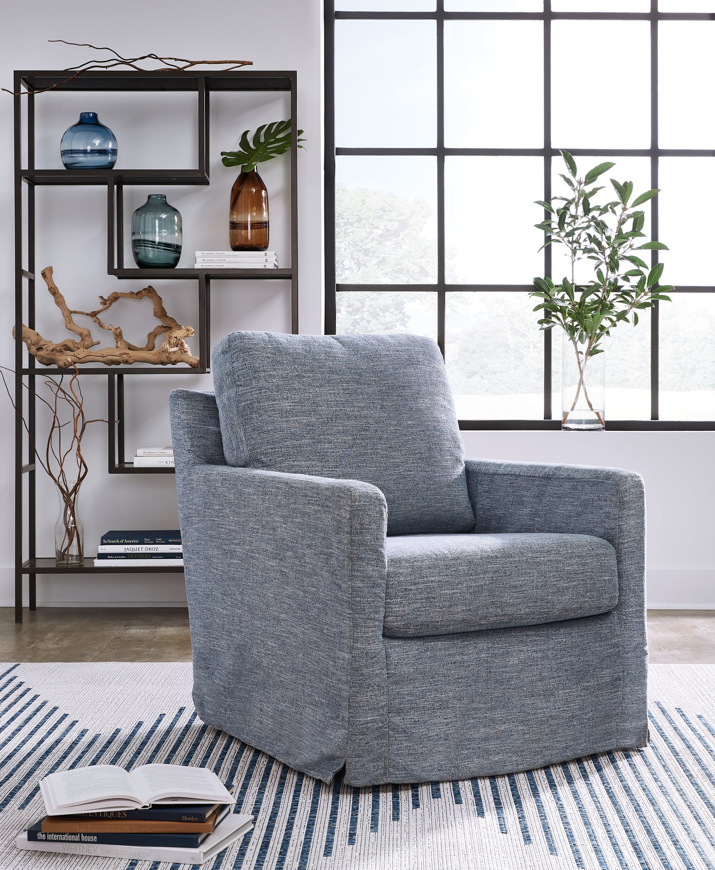 Myers Furniture Outlet - Ashley Furniture - Nenana Next-Gen Nuvella Swivel Glider Accent Chair - Swivel Glider Accent Chair / Denim - A3000646