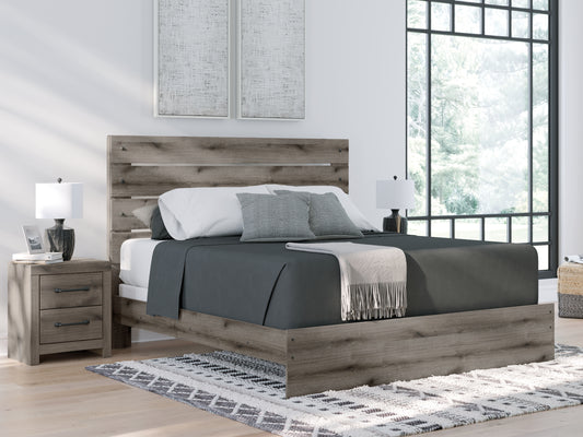 Myers Furniture Outlet - Ashley Furniture - Graystorm Bedroom - Queen Panel Bed / Brown Gray - PCB2405B2