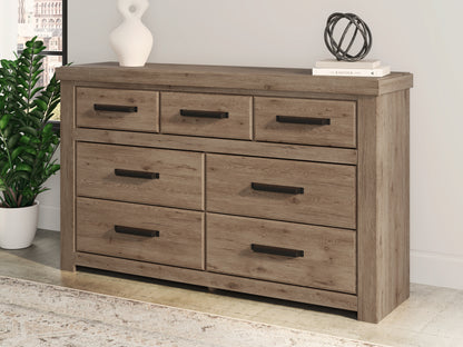 Myers Furniture Outlet - Ashley Furniture - Oliandon Bedroom - Seven Drawer Dresser / Light Brown - PCB2844-31