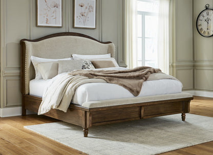 Myers Furniture Outlet - Ashley Furniture - Sturlayne Bedroom - King Upholstered Panel Bed / Brown - B787B4
