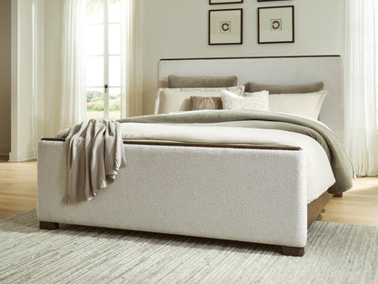 Myers Furniture Outlet - Ashley Furniture - Radkin Bedroom - Queen Upholstered Panel Bed / Burnished Brown - PCB843B2
