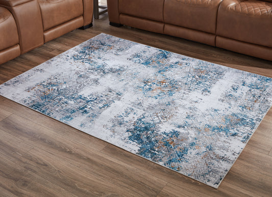 Myers Furniture Outlet - Ashley Furniture - Garyard Rug - 5' x 7' Washable Rug / Multi - R405772
