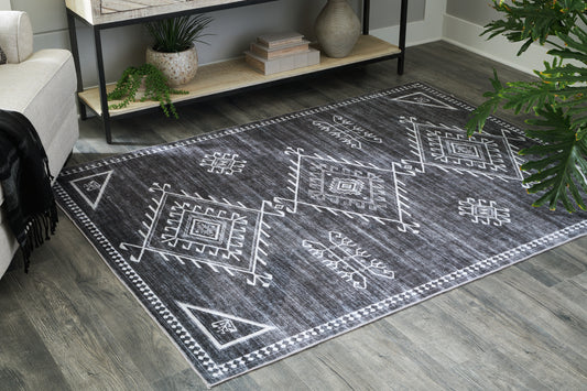 Myers Furniture Outlet - Ashley Furniture - Arloman Rug - 5' x 7' Washable Rug / Black/Cream/Gray - R405932