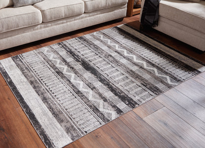 Myers Furniture Outlet - Ashley Furniture - Henchester Rug - 8' x 10' Washable Rug / Multi - R405991
