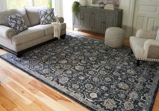 Myers Furniture Outlet - Ashley Furniture - Hilcott Rug - 5'3" x 7'3" Rug / Blue/Cream/Brown - R406112