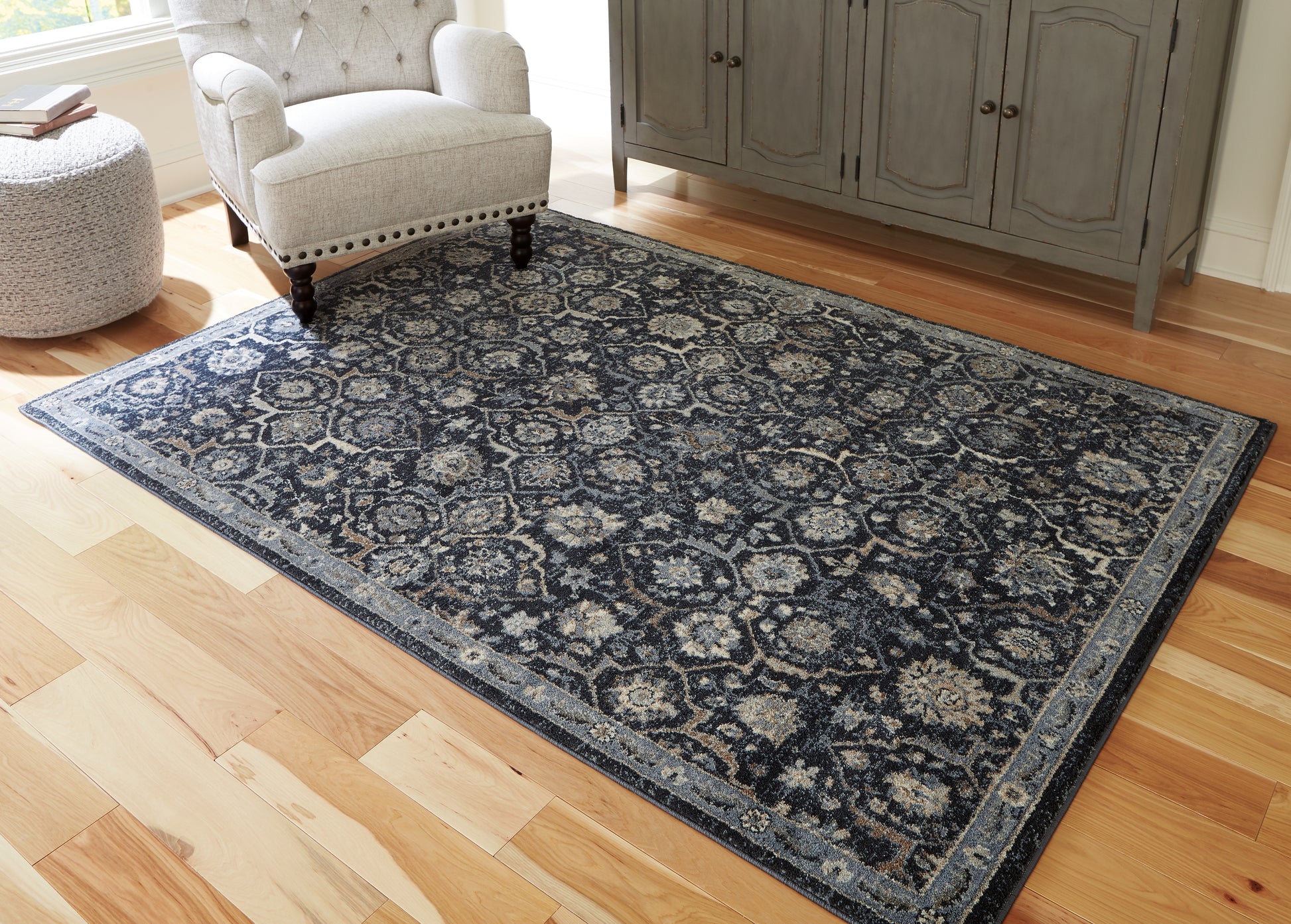 Myers Furniture Outlet - Ashley Furniture - Hilcott Rug - 5'3" x 7'3" Rug / Blue/Cream/Brown - R406112