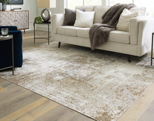 Myers Furniture Outlet - Ashley Furniture - Grifflain Rug - 7'10" x 10'3" Washable Rug / Tan/Brown/Gray - R406231