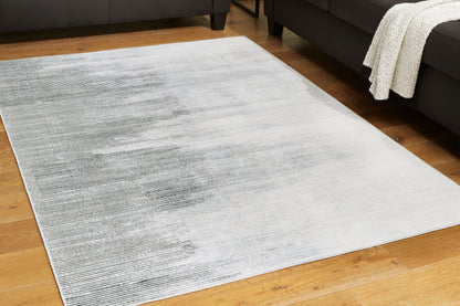 Myers Furniture Outlet - Ashley Furniture - Milset Rug - 8'1" x 10' Washable Rug / Black/White/Gray - R406251