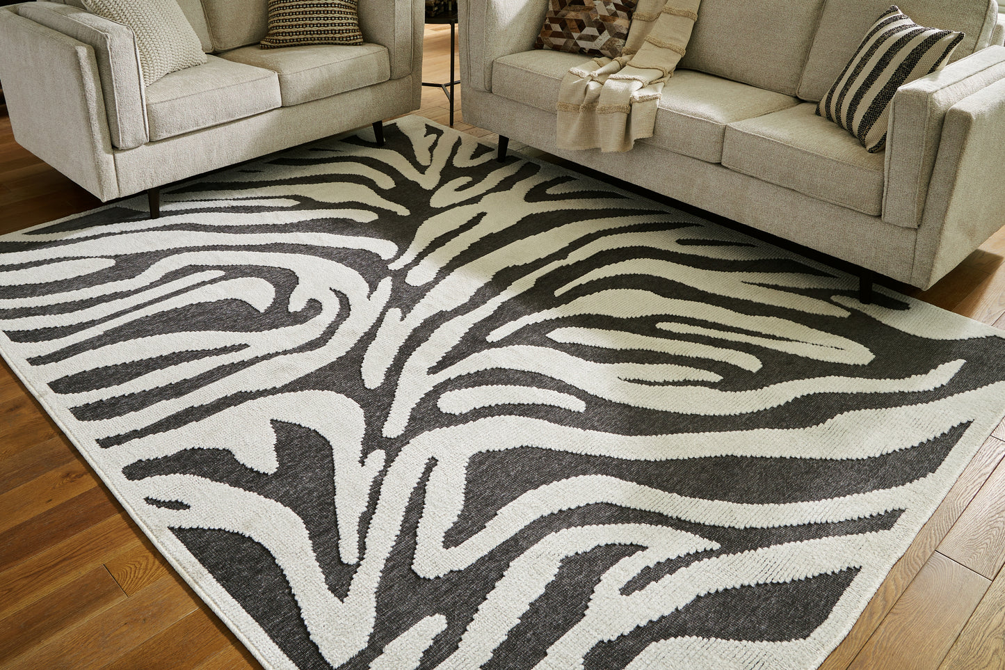 Myers Furniture Outlet - Ashley Furniture - Thomwith Rug - 8' x 10'2" Washable Rug / Black/Ivory - R406291