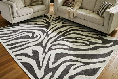 Myers Furniture Outlet - Ashley Furniture - Thomwith Rug - 8' x 10'2" Washable Rug / Black/Ivory - R406291