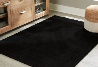 Myers Furniture Outlet - Ashley Furniture - Anaben Rug - 5' x 7' Washable Rug / Black - R406312