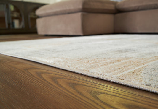 Myers Furniture Outlet - Ashley Furniture - Truward Rug - 5' x 7' Rug / Linen/Gray/Caramel - R406472