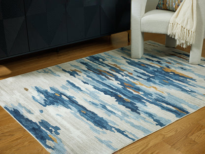 Myers Furniture Outlet - Ashley Furniture - Vinlett Rug - 5' x 7' Washable Rug / Cream/Blue/Brown - R407042