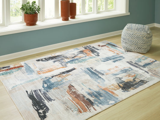Myers Furniture Outlet - Ashley Furniture - Hessland Rug - 8' x 10' Washable Rug / Multi - R407051