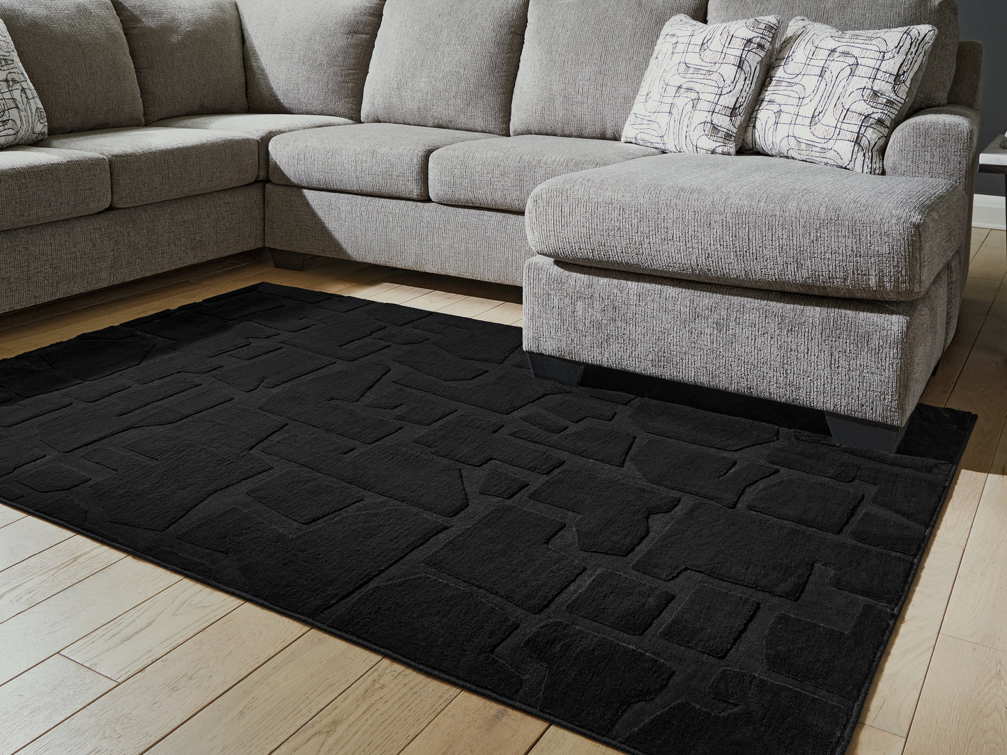 Myers Furniture Outlet - Ashley Furniture - Gibbswell Rug - Washable 5' x 7' Area Rug / Black - R407462