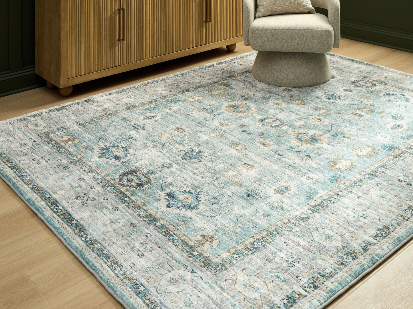 Myers Furniture Outlet - Ashley Furniture - Ladstoney Rug - 7'6" x 9'6" Area Rug / Teal/Beige/Ochre - R407501