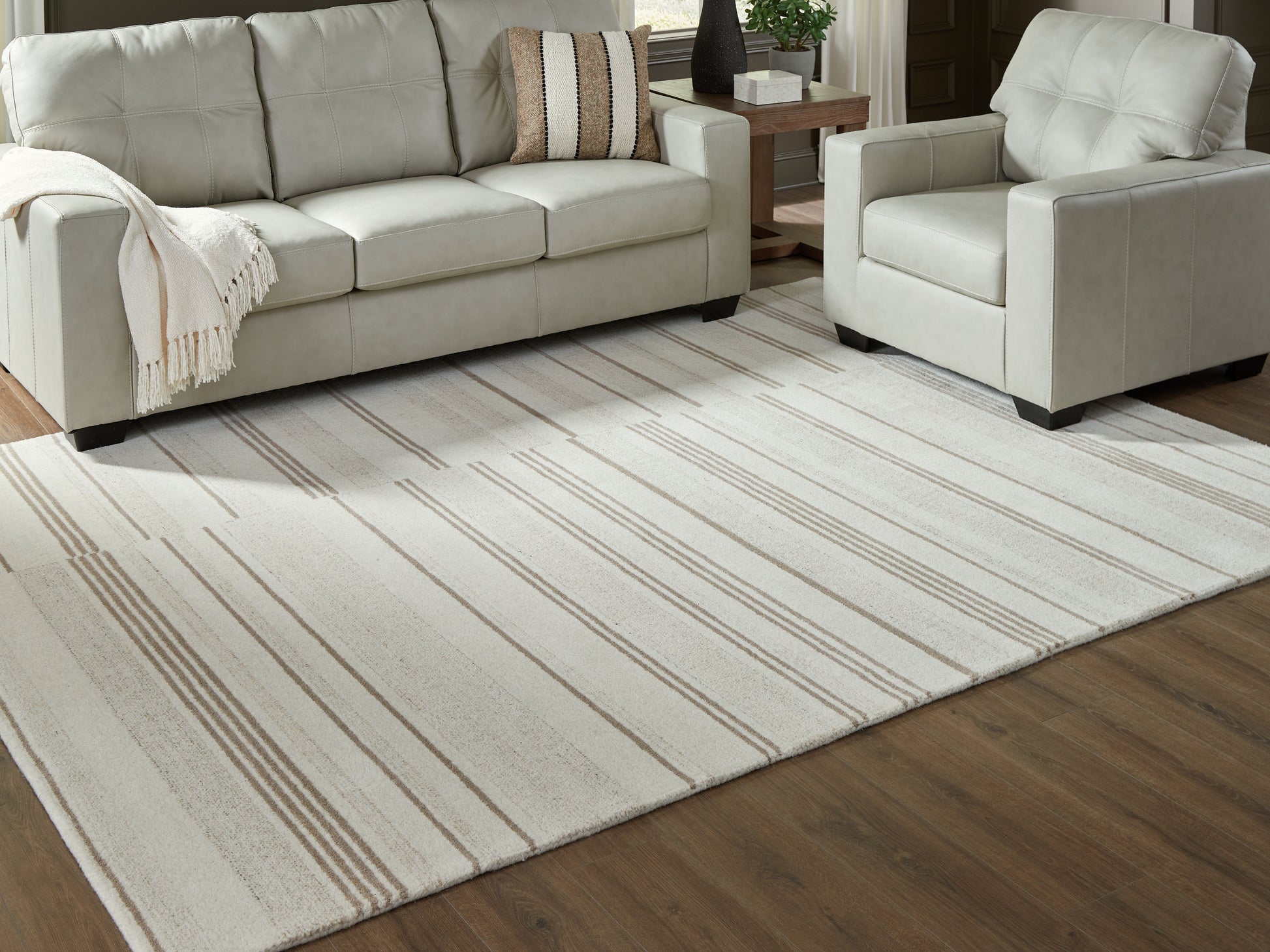 Myers Furniture Outlet - Ashley Furniture - Gadence Rug - 7'8" x 10' Area Rug / Ivory/Tan - R407641
