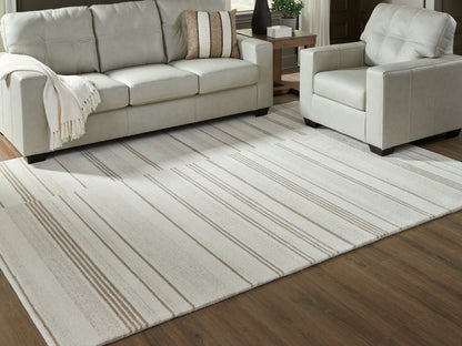 Myers Furniture Outlet - Ashley Furniture - Gadence Rug - 7'8" x 10' Area Rug / Ivory/Tan - R407641