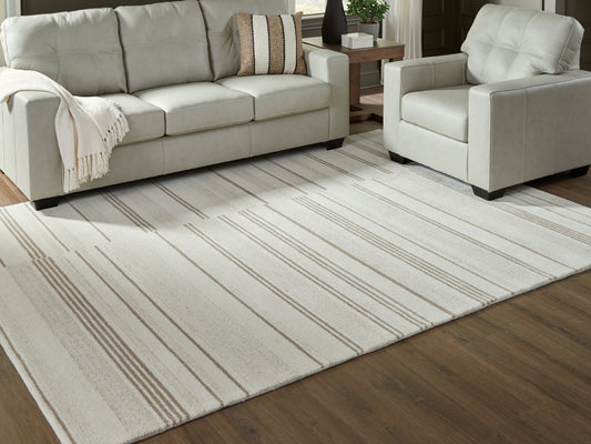Myers Furniture Outlet - Ashley Furniture - Gadence Rug - 7'8" x 10' Area Rug / Ivory/Tan - R407641