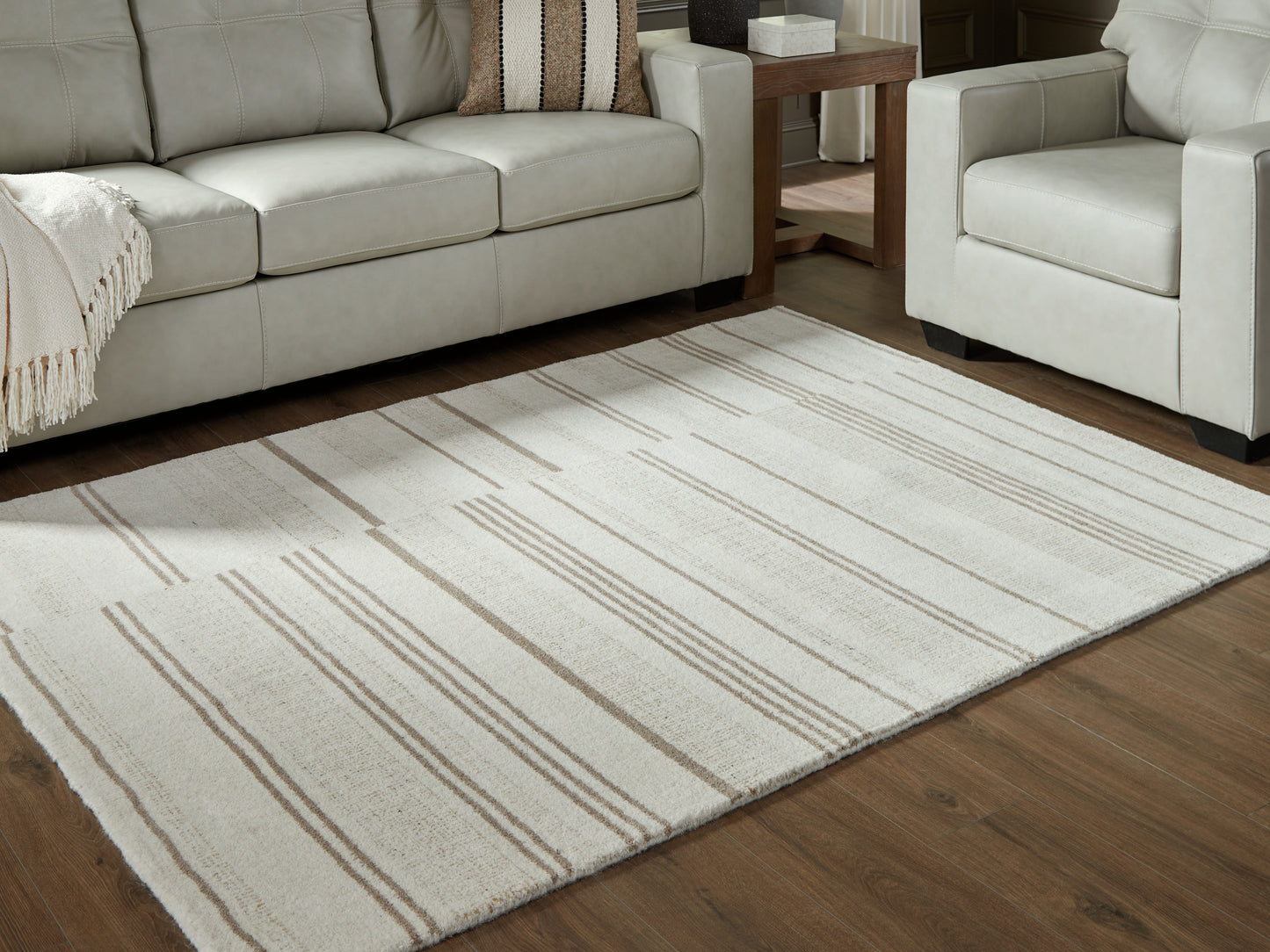 Myers Furniture Outlet - Ashley Furniture - Gadence Rug - 5' x 7' Area Rug / Ivory/Tan - R407642