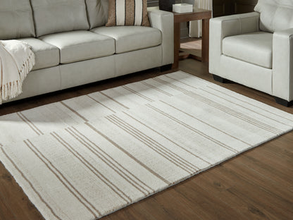 Myers Furniture Outlet - Ashley Furniture - Gadence Rug - 5' x 7' Area Rug / Ivory/Tan - R407642
