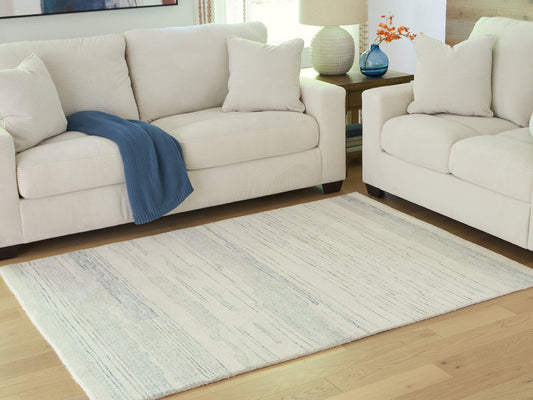 Myers Furniture Outlet - Ashley Furniture - Genemost Rug - 7'8" x 10' Area Rug / Ivory/Blue - R407841